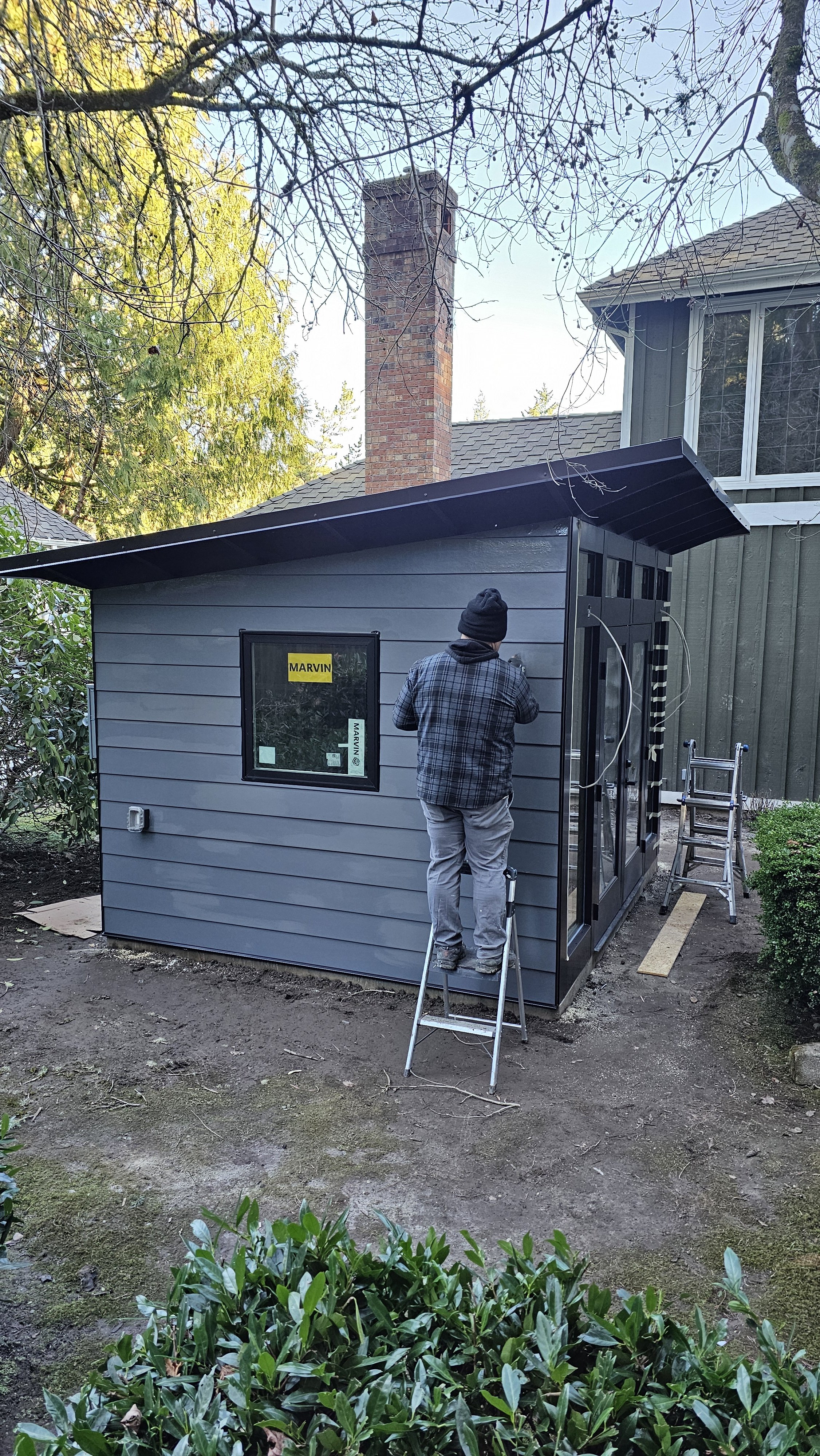 STUDIO SHED 4 siding installed