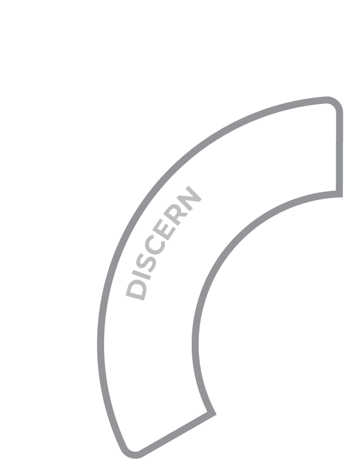 A curved plastic spoon with the word 'DISCERN' written on it.