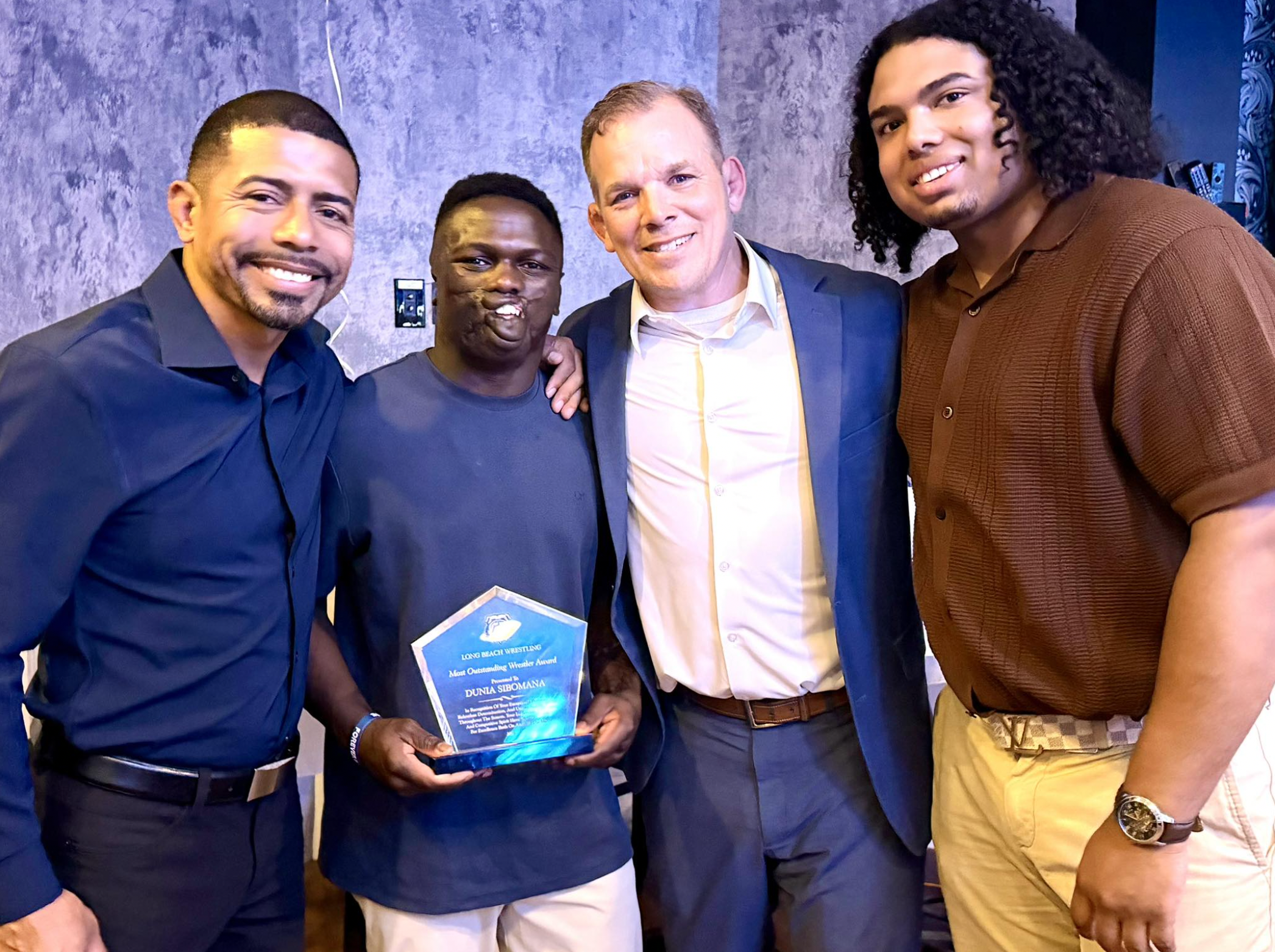 Dunia Sibomana-Rodriguez won a national high school wrestling title!
