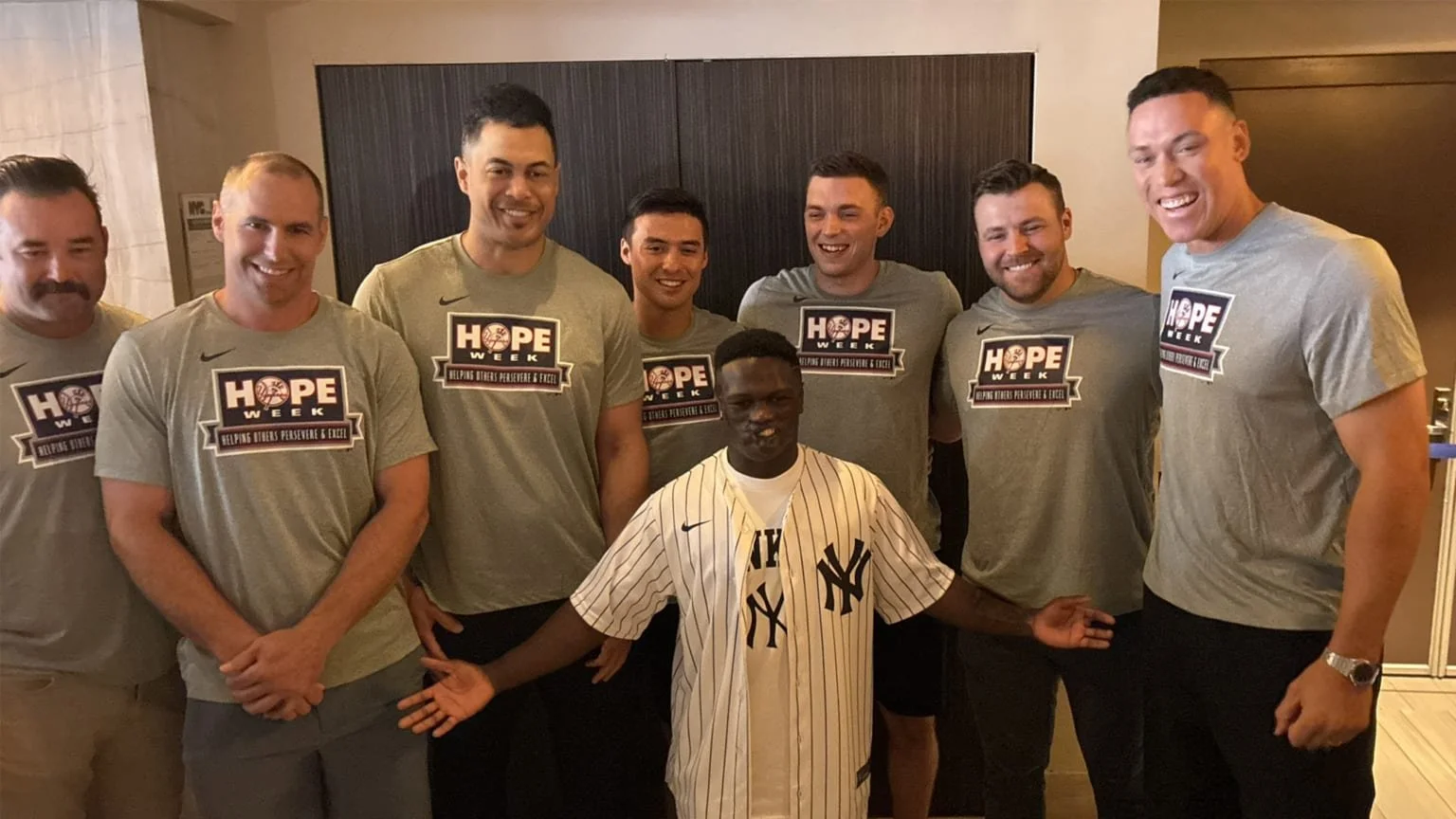 Chimp attack survivor turned HS wrestling star surprised by room full of Yankees
