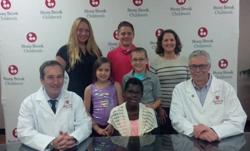 https://riverheadlocal.com/2014/06/05/ten-surgeries-result-in-new-face-and-smile-for-saline-from-kenya/