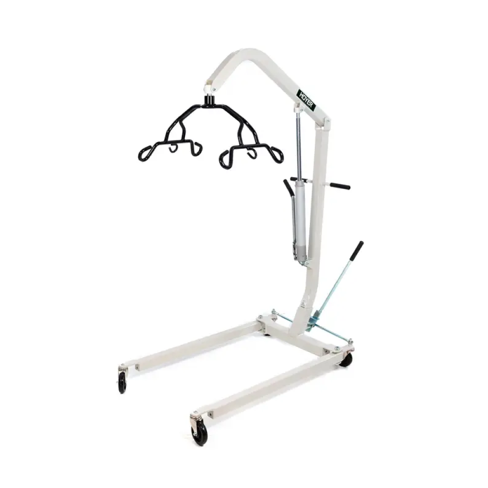 Hospital patient lift with a black sling and white frame on wheels.