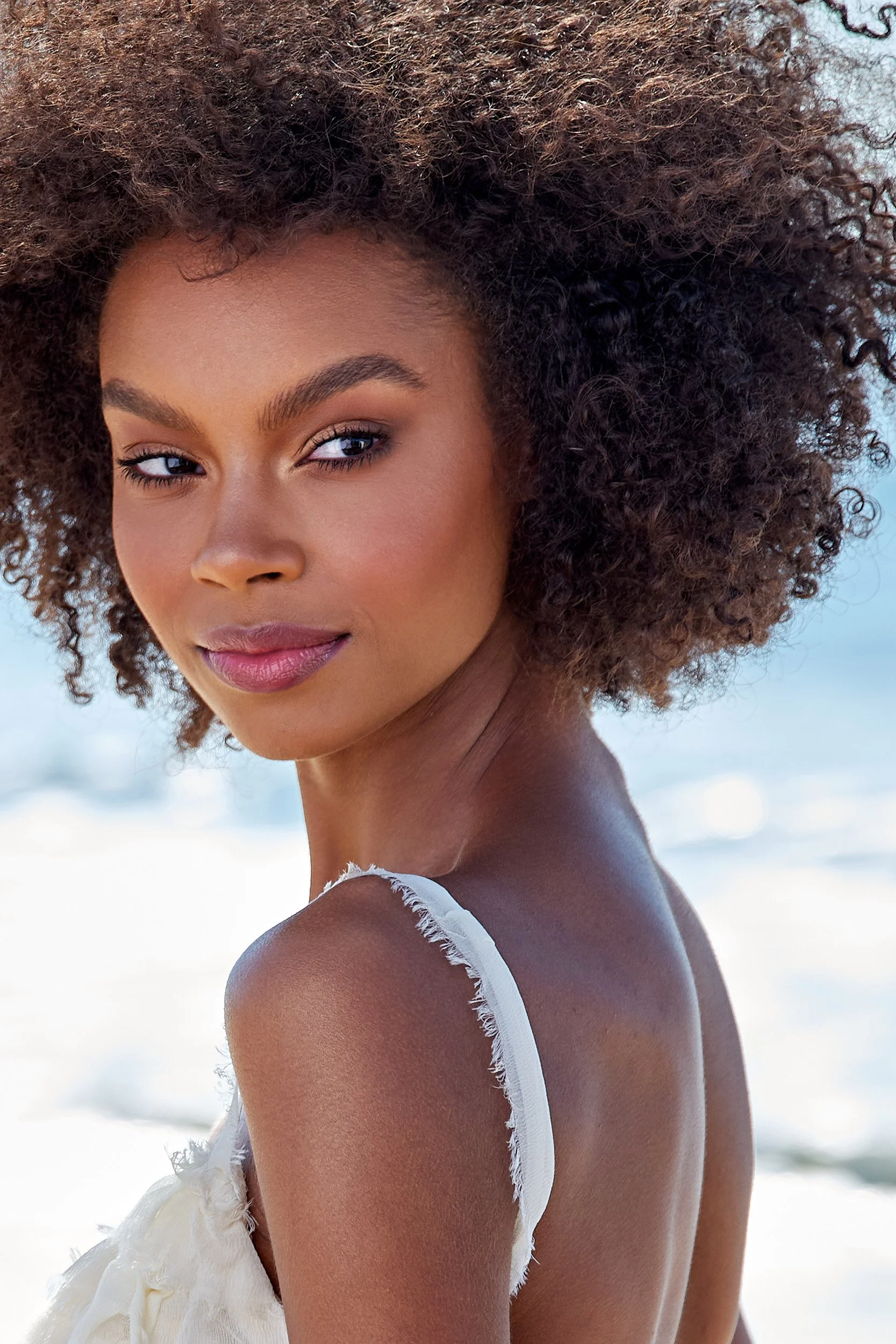Editorial portrait of woman with natural hair in Santa Monica Californiaby commercial photographer Arsen Vasquez