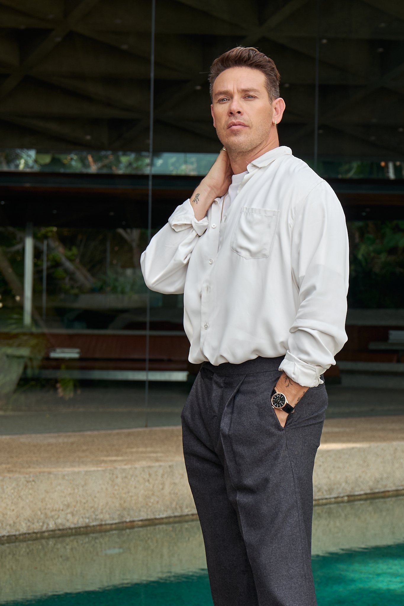 Editorial portrait of actor Kevin Alejandro  in white shirt by Arsen Vasquez Photography in the Hollywood Hills California 
