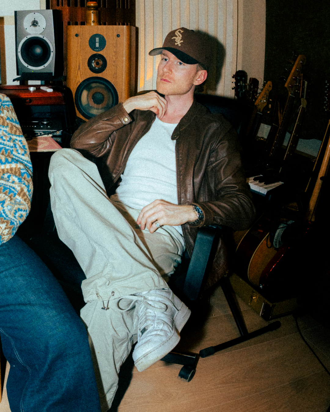Music producer and songwriter in studio, founder of The Music Makers Club, sharing music marketing and industry experience including Spotify playlist success and millions of streams