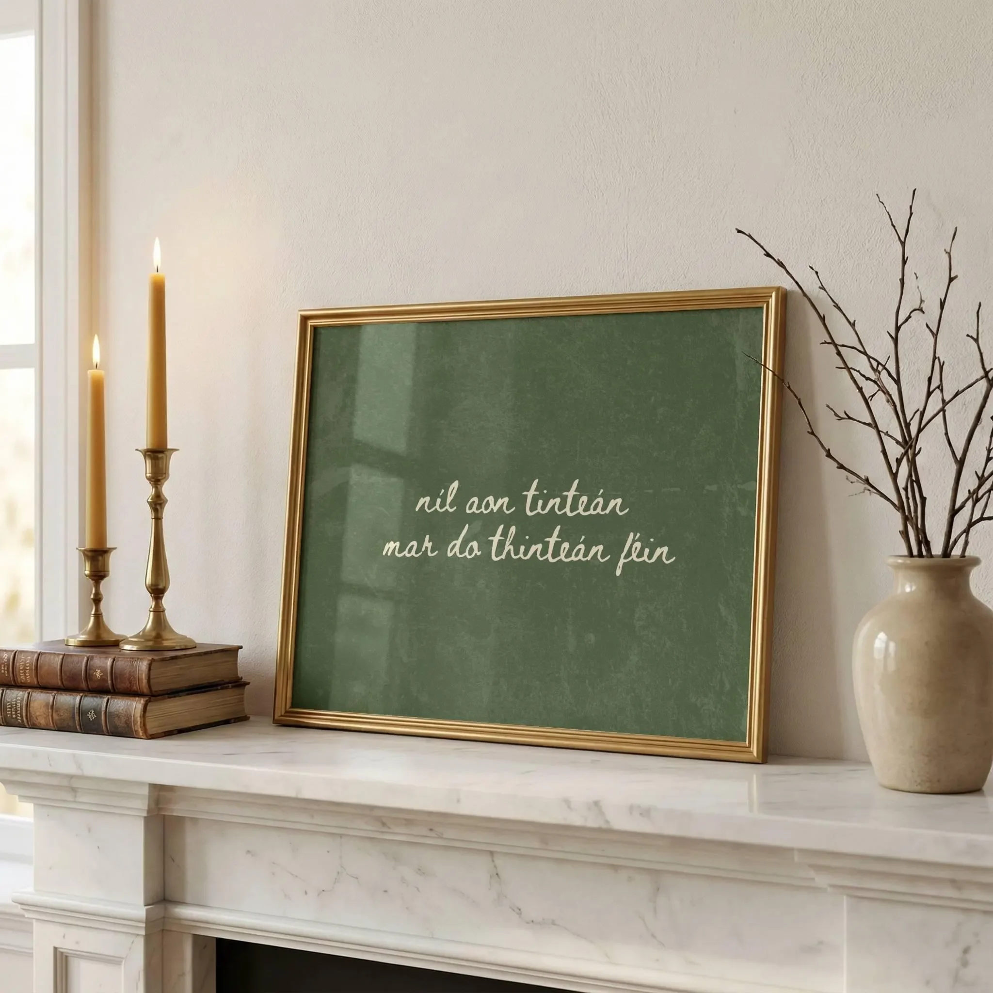 Modern Irish language print in forest green with the seanfhocal proverb meaning there's no place like home