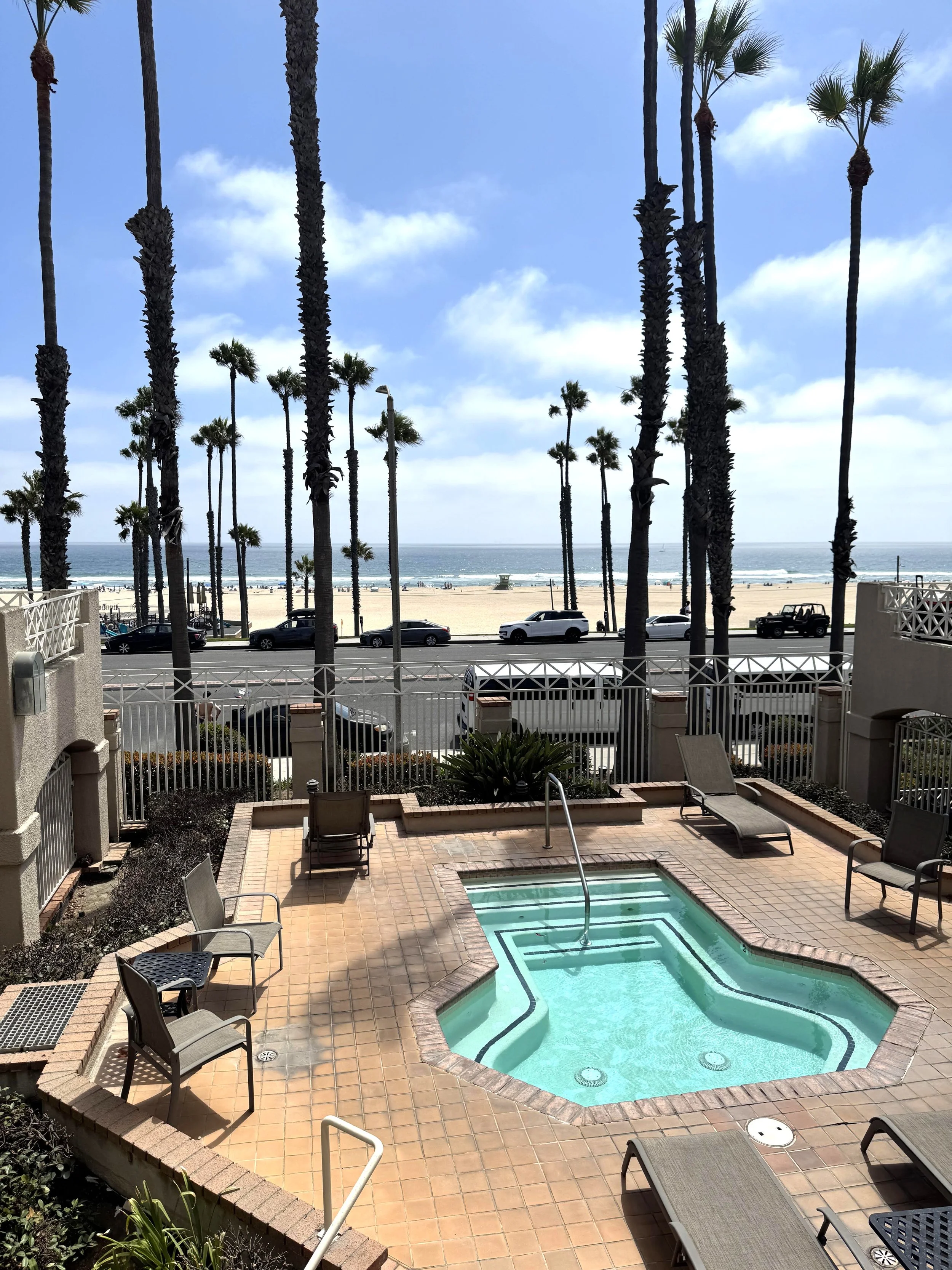 Faire Rivage condos for sale in Huntington Beach, CA featuring the community spa overlooking the ocean.