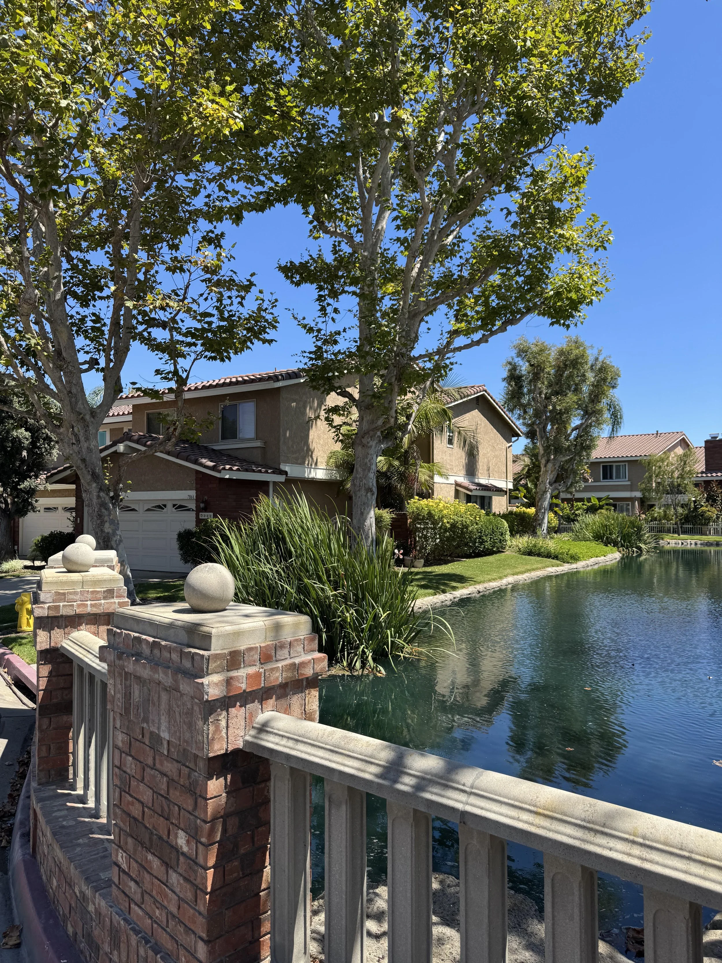 Seaside Village townhomes for sale in Huntington Beach featuring a townhome on the lagoon.