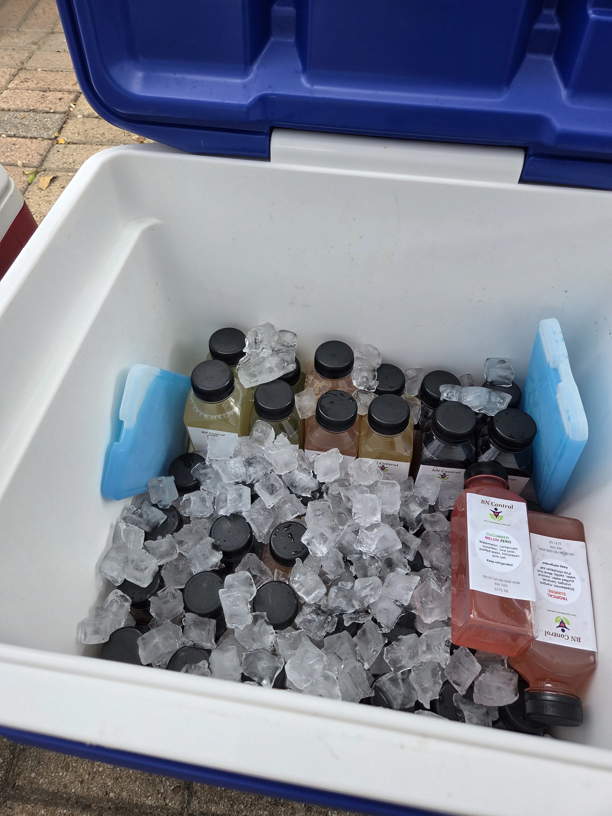 Juice bottles kept frozen/chilled to retain freshness