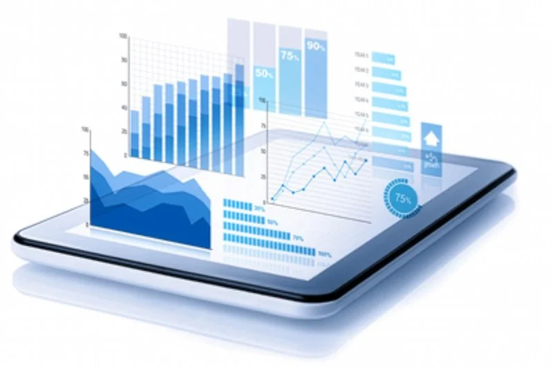Digital tablet displaying overlaid blue data charts, bar graphs, and line graphs representing analytics and statistics.
