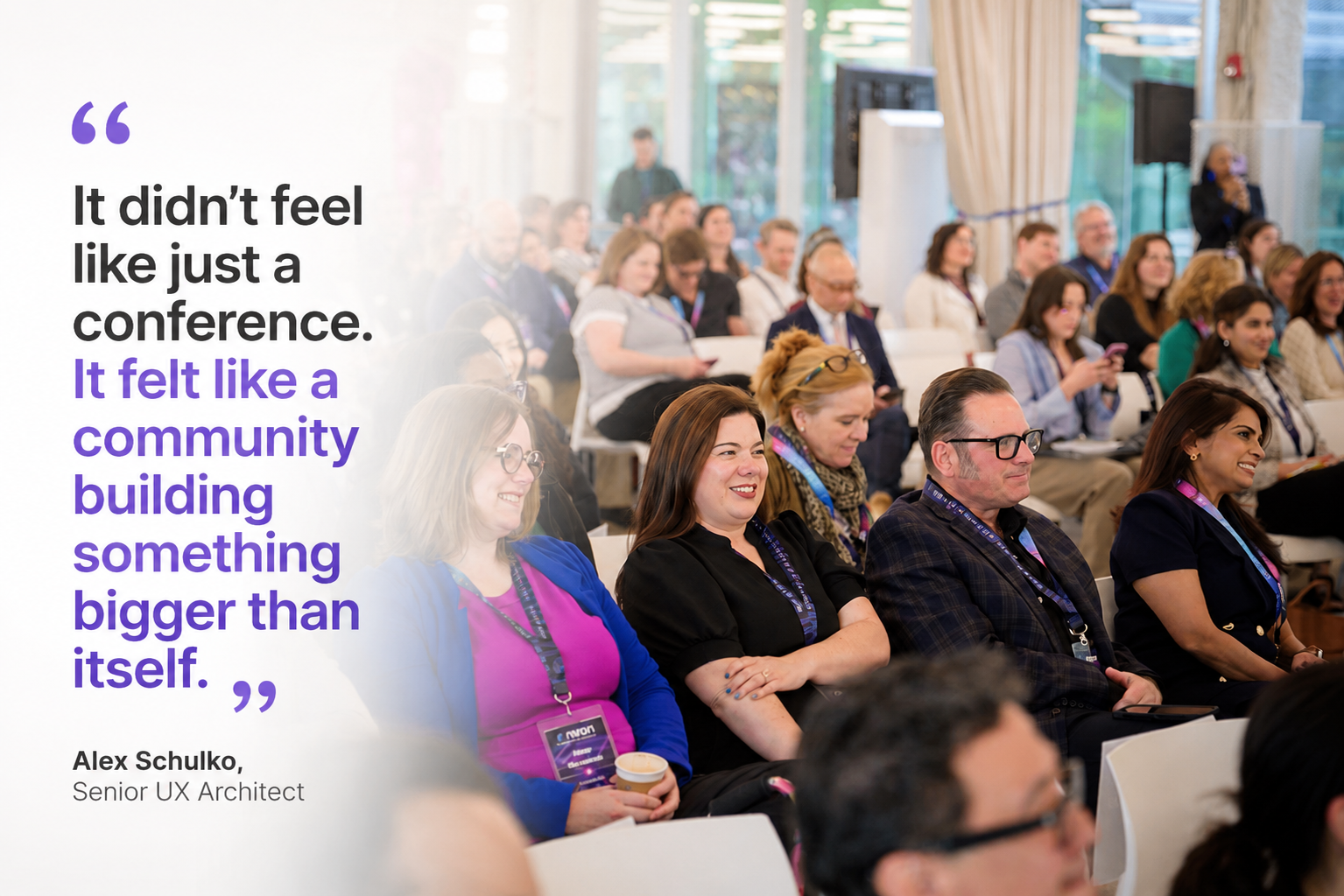People sitting and smiling at Nivan Live  or seminar with a quote overlay on the left side that reads, 'It didn't feel like just a conference. It felt like a community building something bigger than itself.' by Alex Schulko, Senior UX Architect.