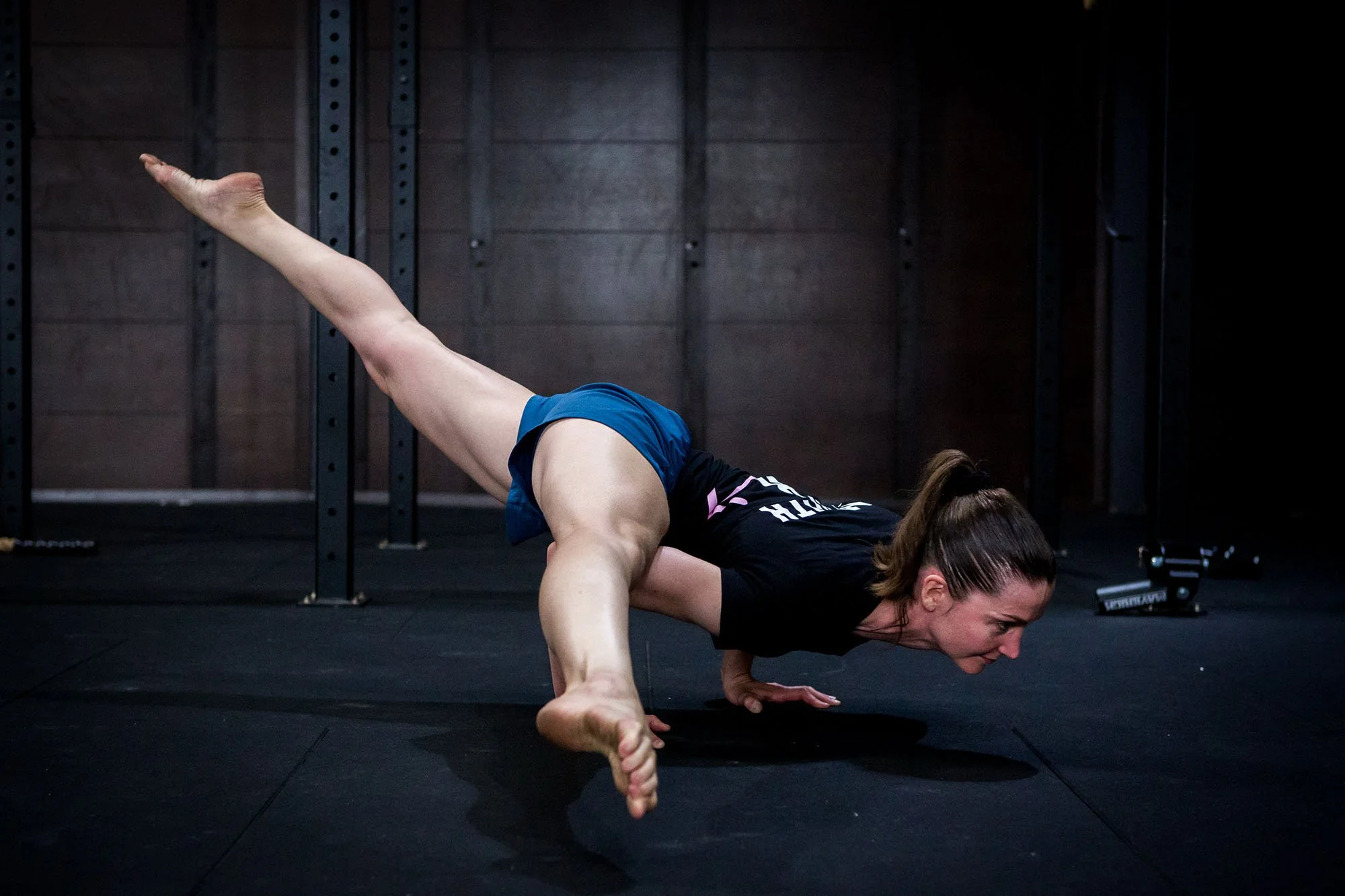 woman performing an arm balance