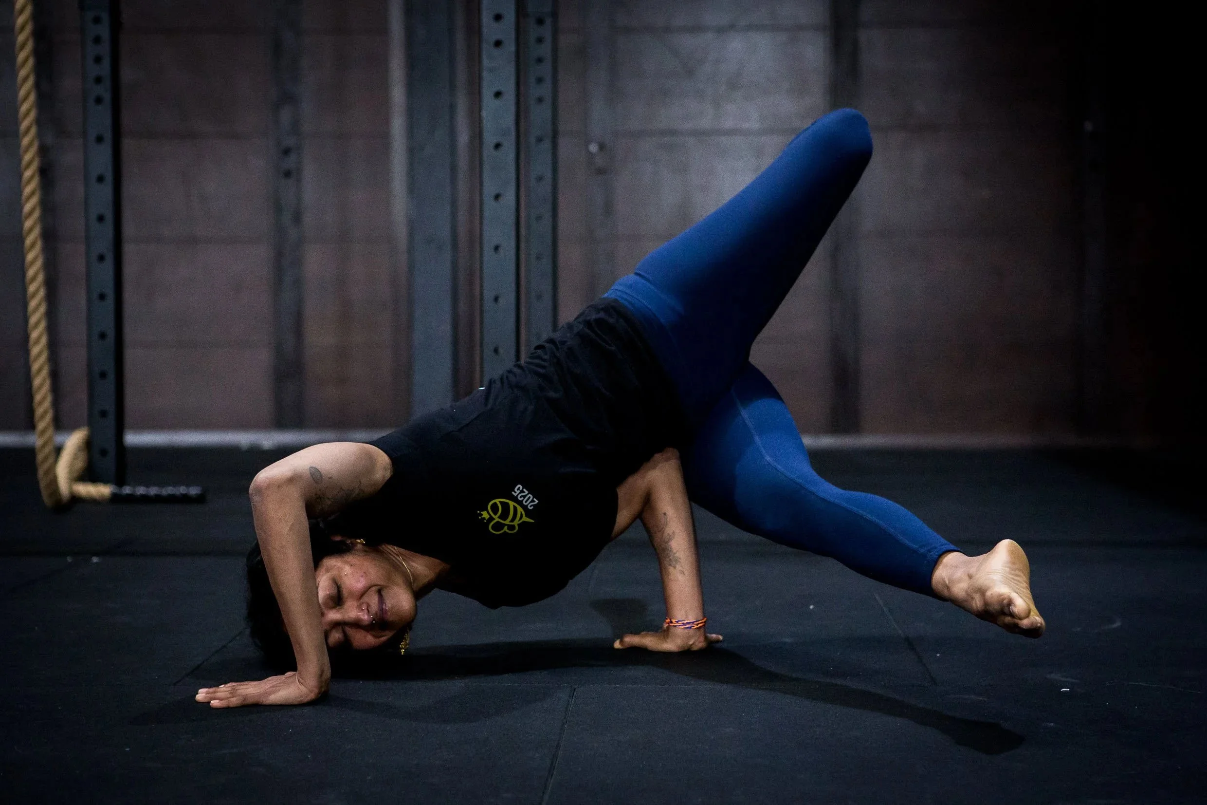 woman performing an arm balance