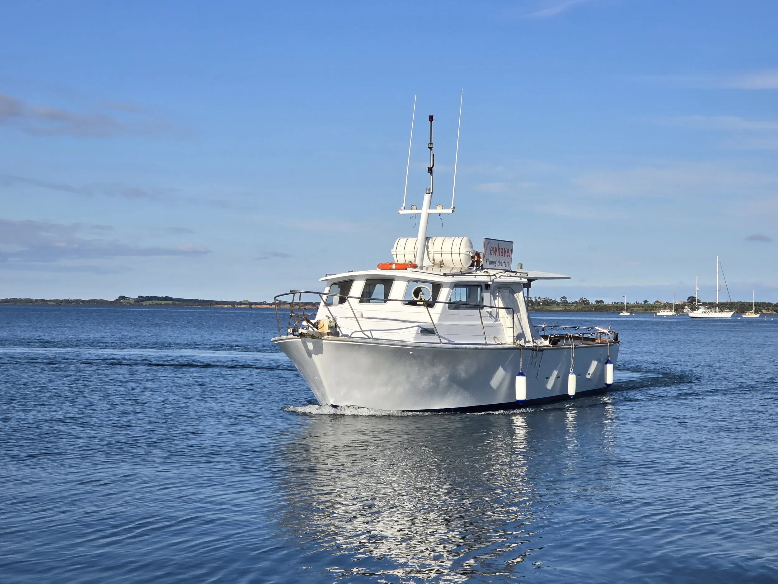 Whale Watching Tour Boat equipped with all the necessary safety equipment for family whale watching charters.