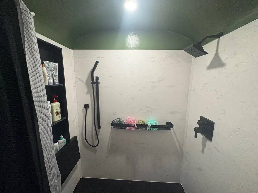 tub-to-shower-conversion-marble-walls-barrel-ceiling-black-fixtures-warren-ohio.jpg
