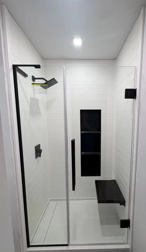samuel-mueller-shower-remodel-clear-glass-door-matte-black-fixtures-lordstown-ohio.jpg