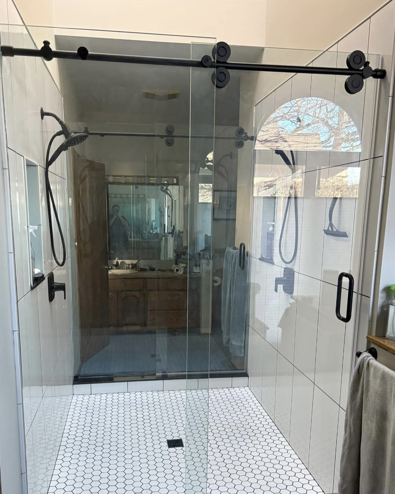 Double entry custom glass shower custom tile pencil liner