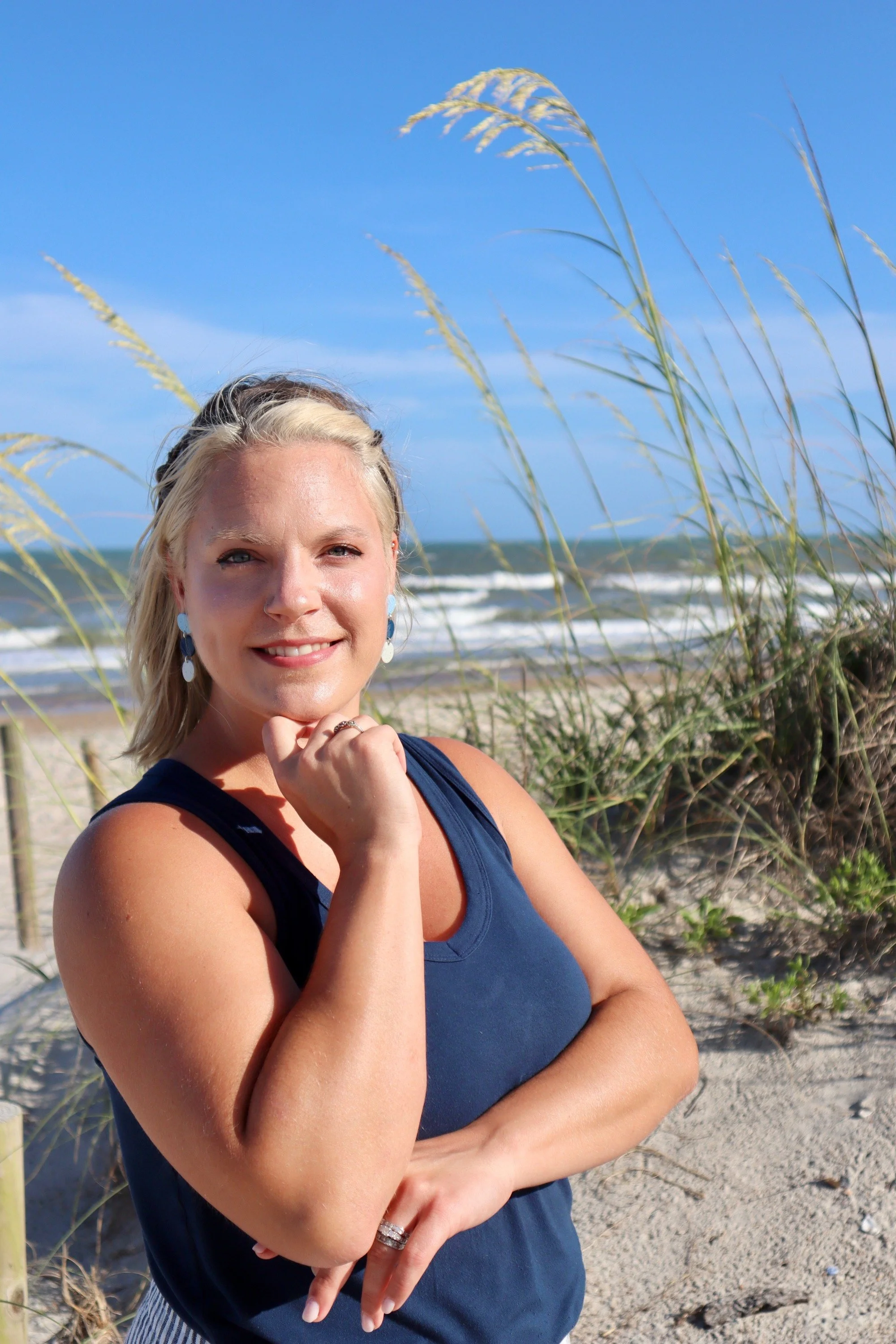 Professional beach portrait of a business owner in Jacksonville, North Carolina