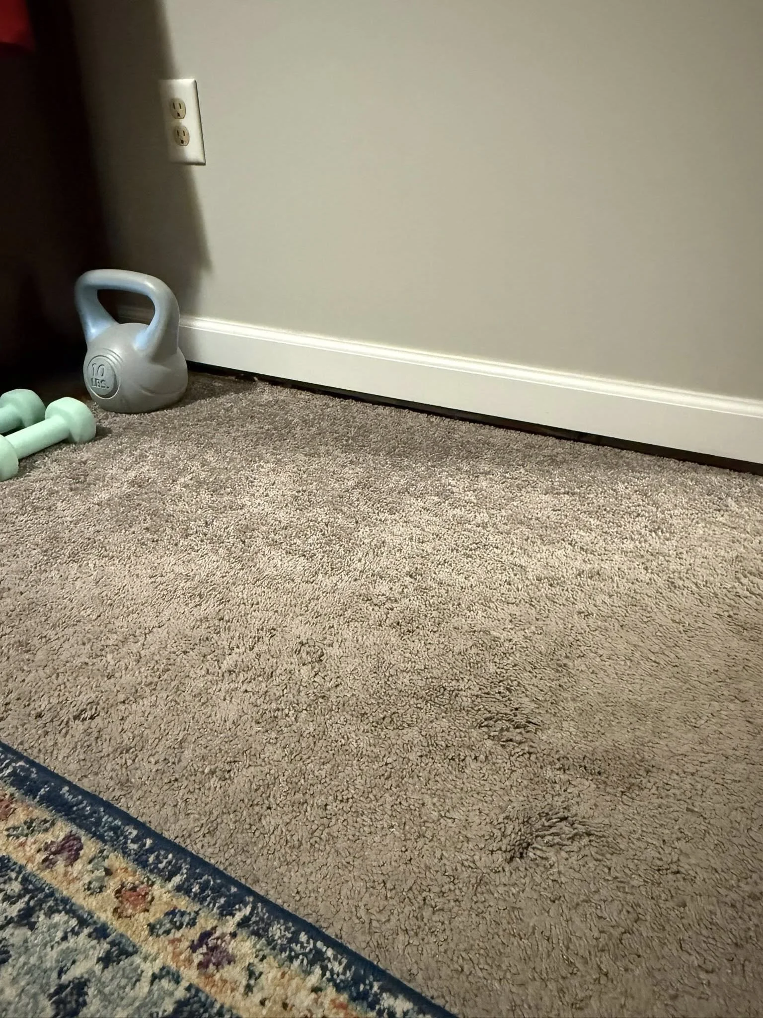 Photo of gap that appears between floor and wall when a floor is sagging