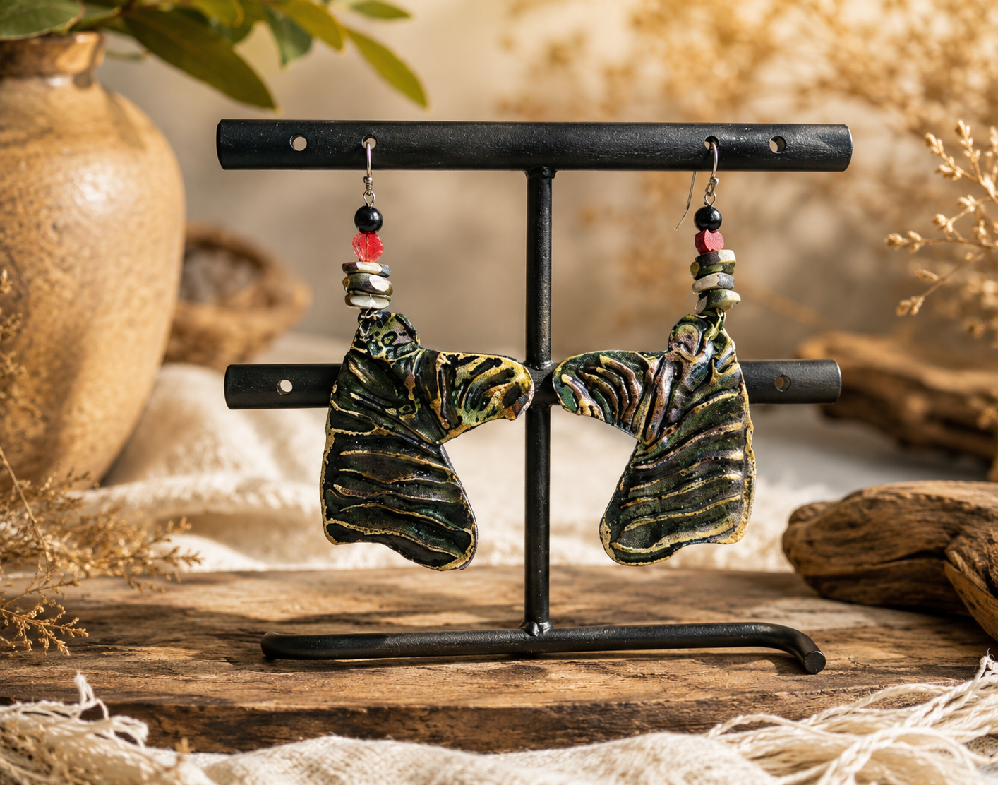  The Zebra Spirit Earrings"-Playful, sculptural, and wonderfully unexpected. These lightweight zebra-head earrings combine bone, agate, onyx, and leather. Made to bring a little wild spirit to your look!    Available by Commission 