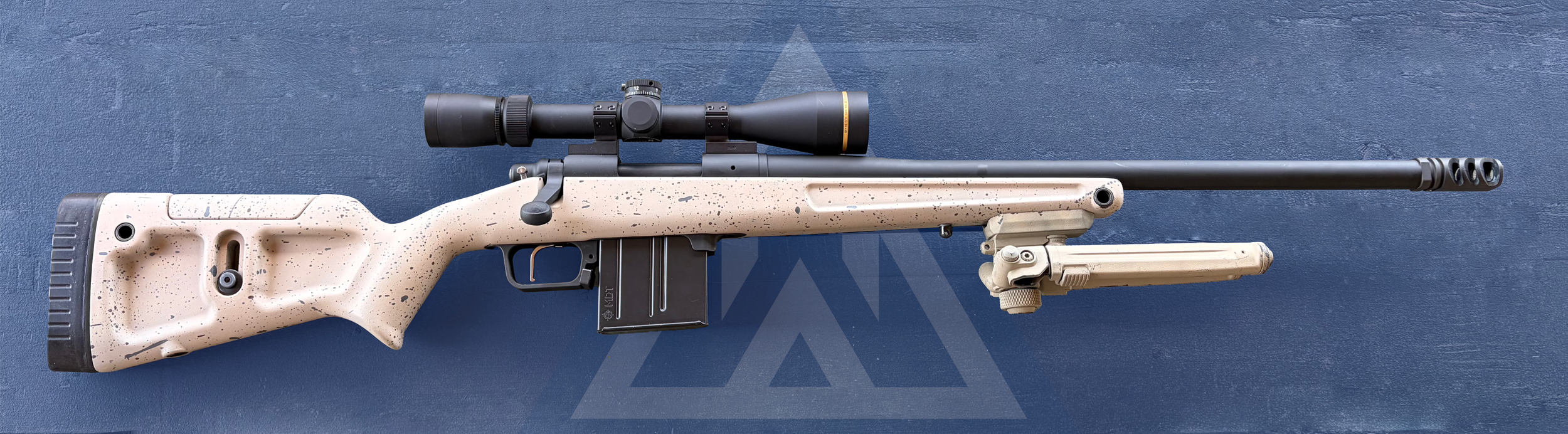 Remington 700: Converted to BDM, rebarreled, bedded, accurized, and cerakoted. 