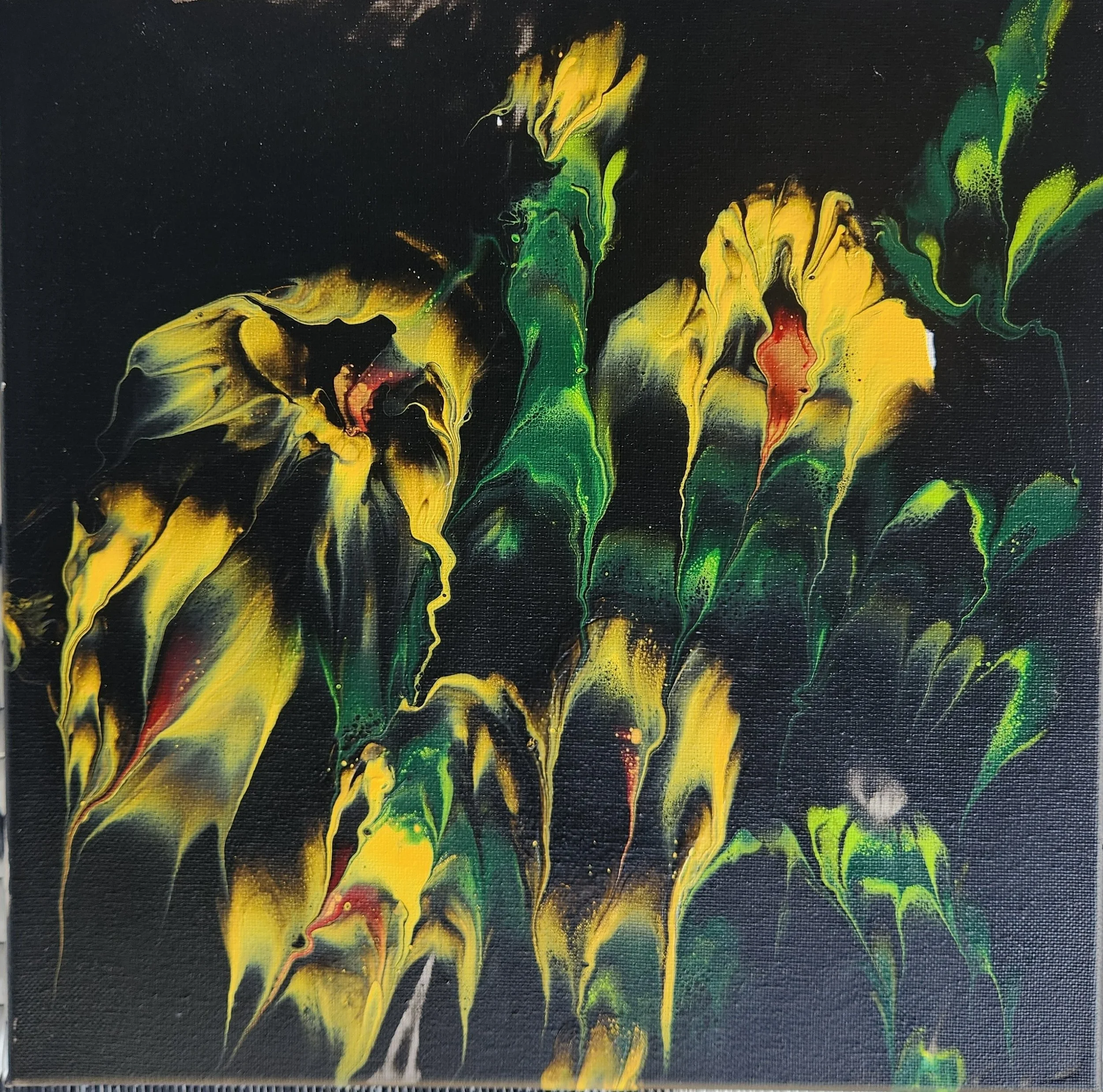 Abstract painting with yellow, green, black, and red colors on a dark background.