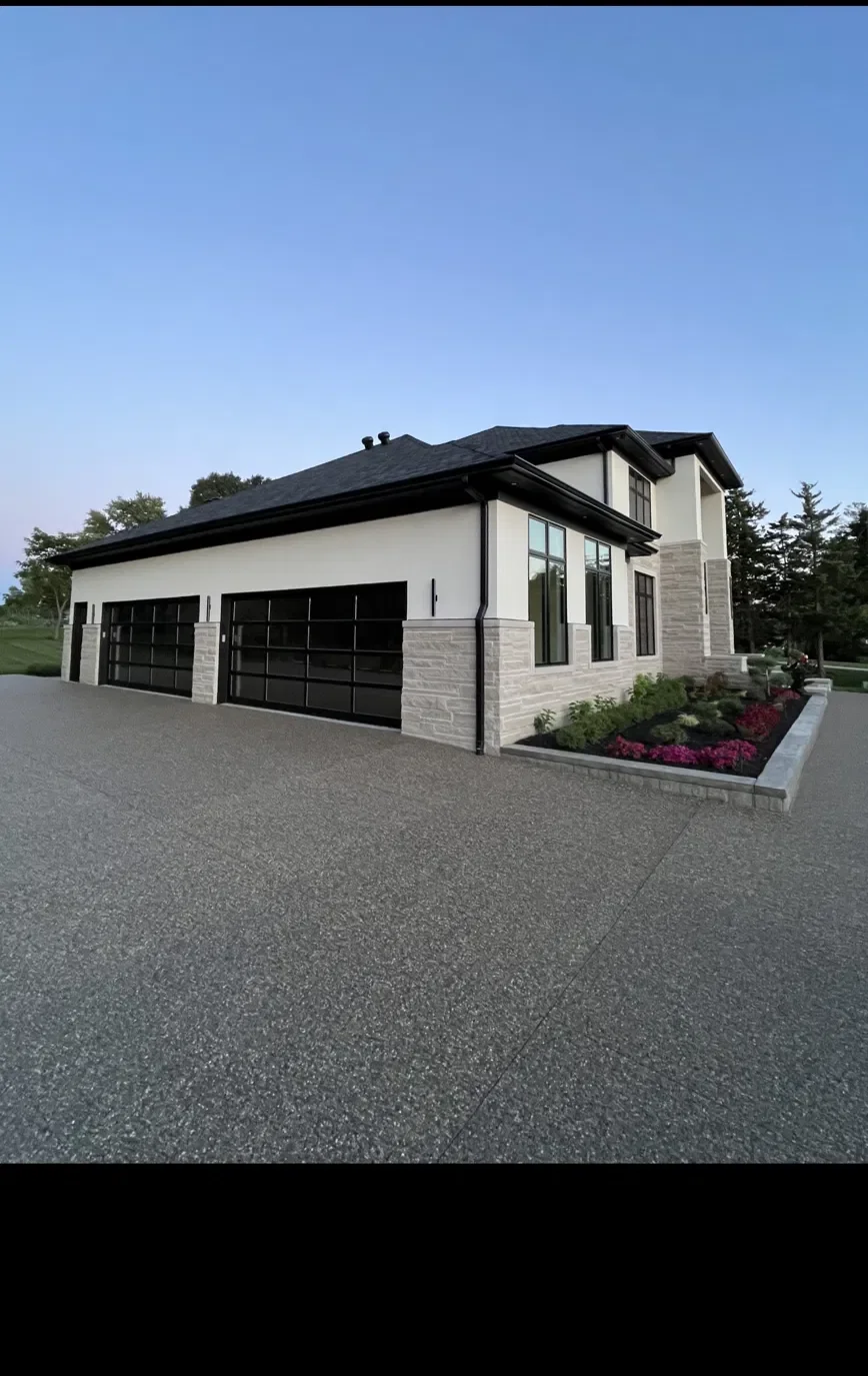 Residential window tinting on luxury home in Macomb Michigan by Expert Auto Spa — serving Sterling Heights, Clinton Township, Shelby Township and Metro Detroit
