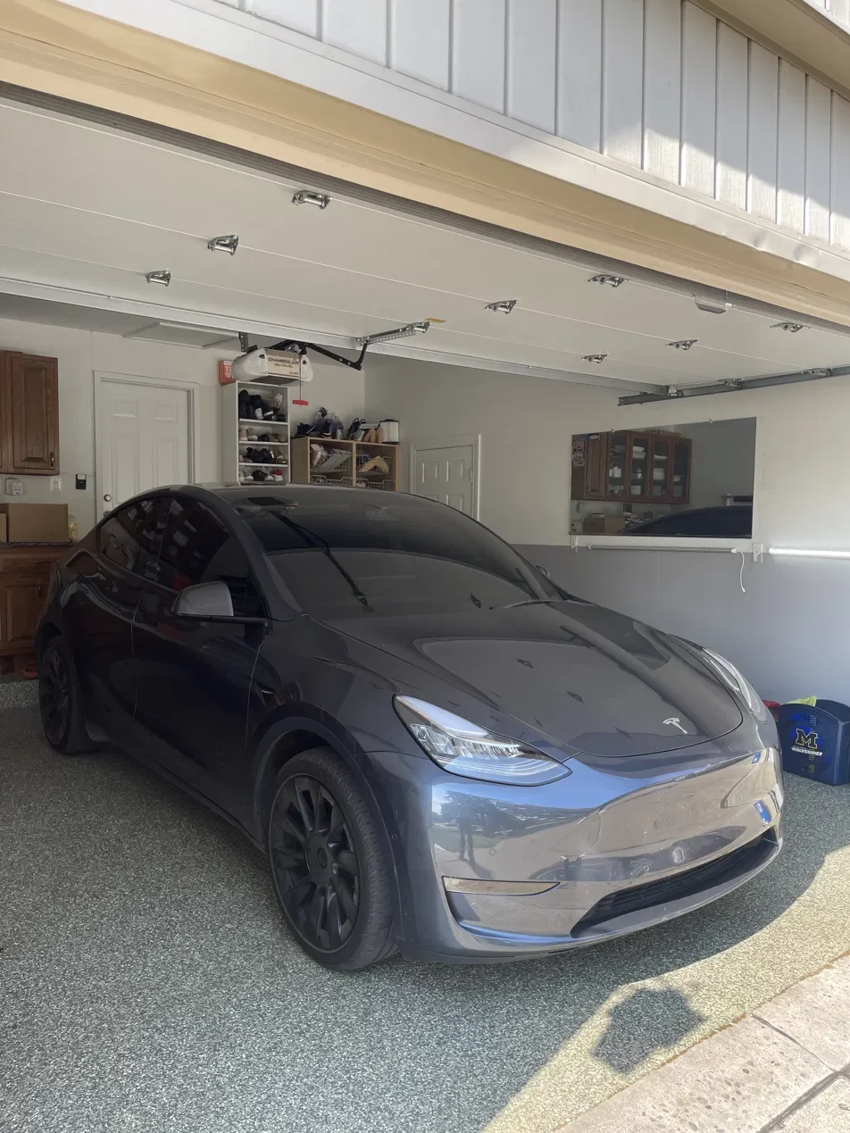 Professional paint correction on Tesla Model Y by Expert Auto Spa in Macomb Michigan — removing swirl marks, scratches, and oxidation serving Sterling Heights, Clinton Township, and Metro Detroit