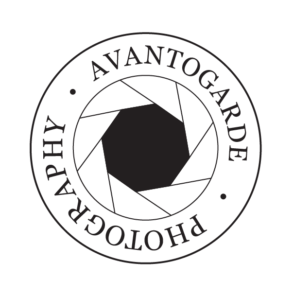 A circular logo with the words 'PHOTOGRAPHY BY AVANTGARDE' around a camera shutter icon in the center.