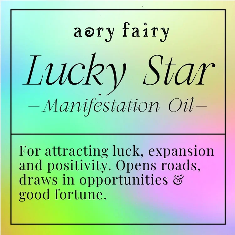 Label for 'Lucky Star Manifestation Oil' with a rainbow-colored background, describing it as an oil for attracting luck, expansion, positivity, and good fortune.