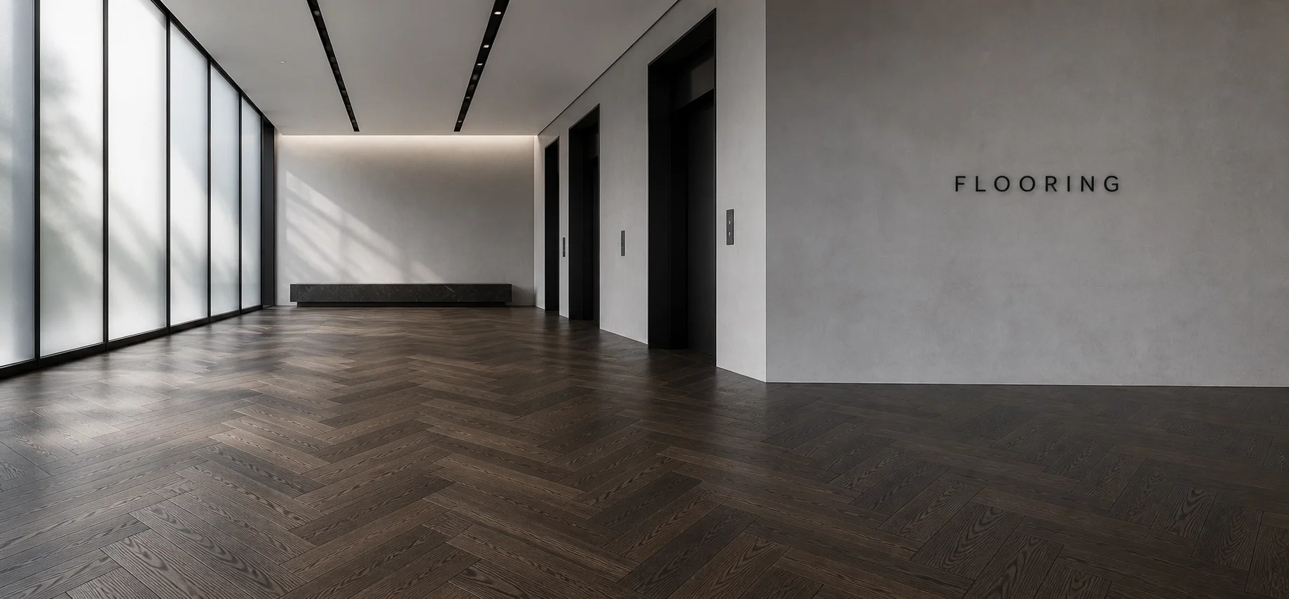 Modern interior space with large frosted glass windows, dark wood herringbone flooring, white walls, black elevator doors, and the word 'FLOORING' on the wall.