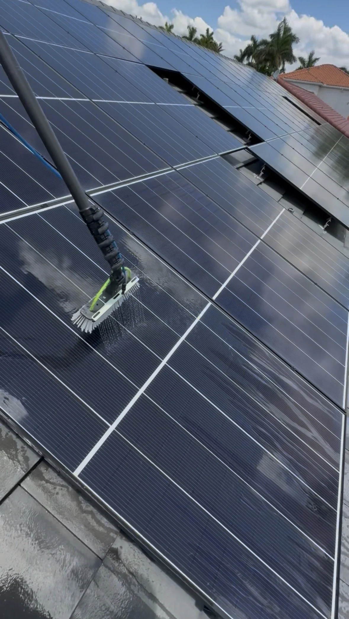 Solar panel cleaning to improve efficiency for a residential home in South Florida.