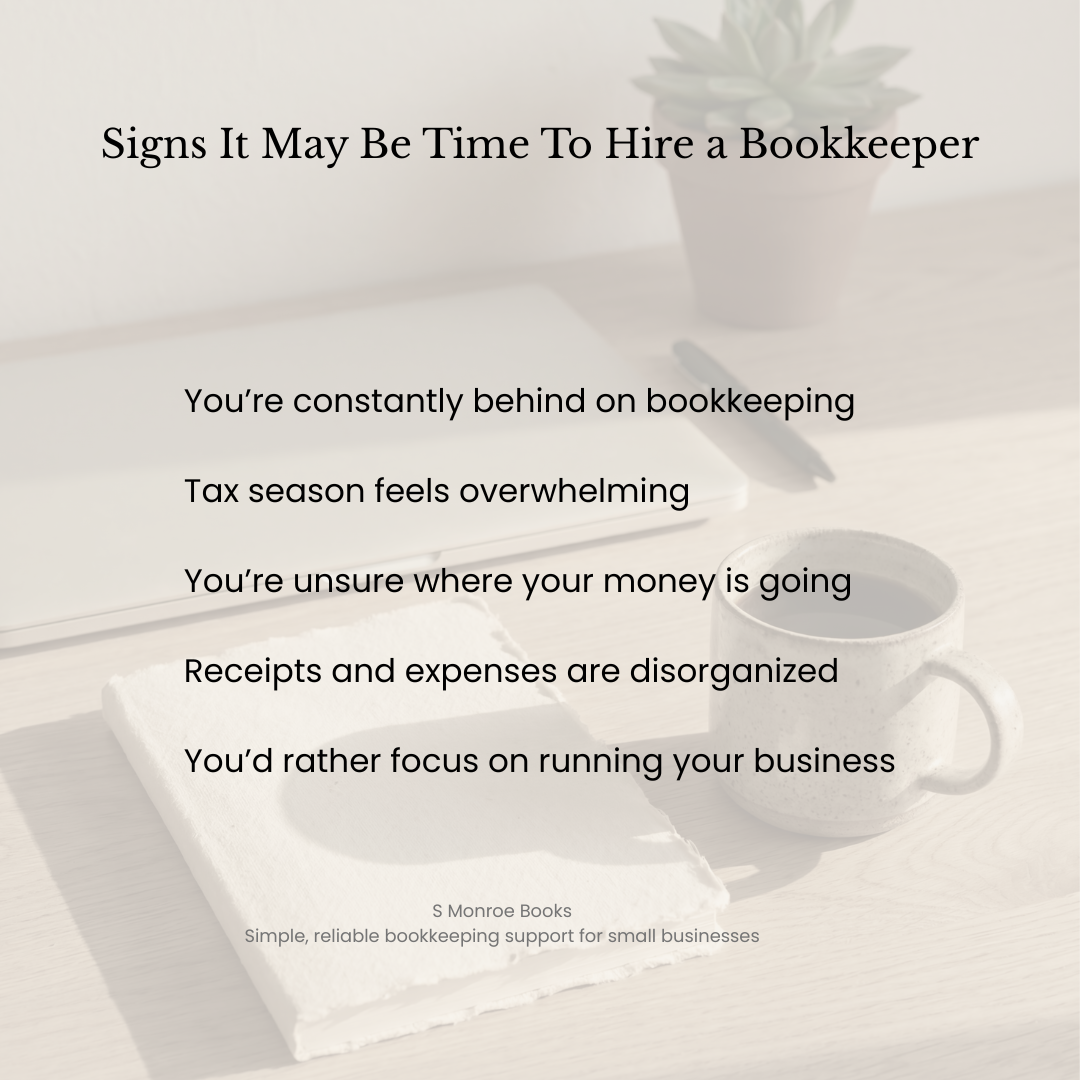 A promotional poster with the title 'Signs It May Be Time To Hire a Bookkeeper' and bullet points listing signs, including being behind on bookkeeping, overwhelming tax season, unsure where money is going, disorganized receipts and expenses, and preferring to focus on running the business. The background features a coffee mug, notebook, pen, and plant on a desk.