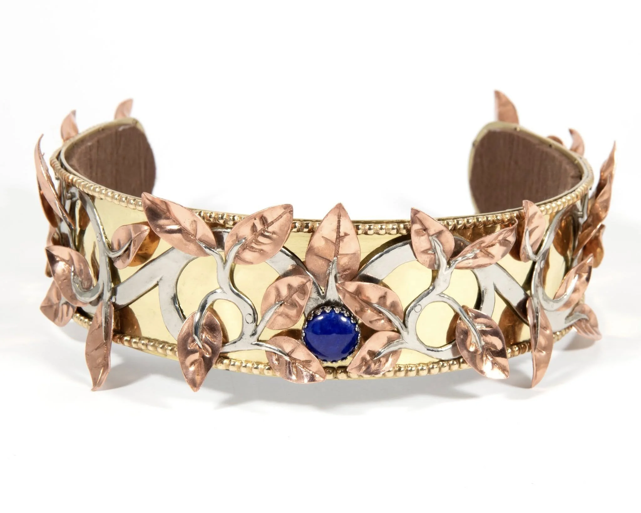 Laurel for Zhigmun', 2024, Brass, Nickel, Copper, Sterling silver, Lapis & Felt