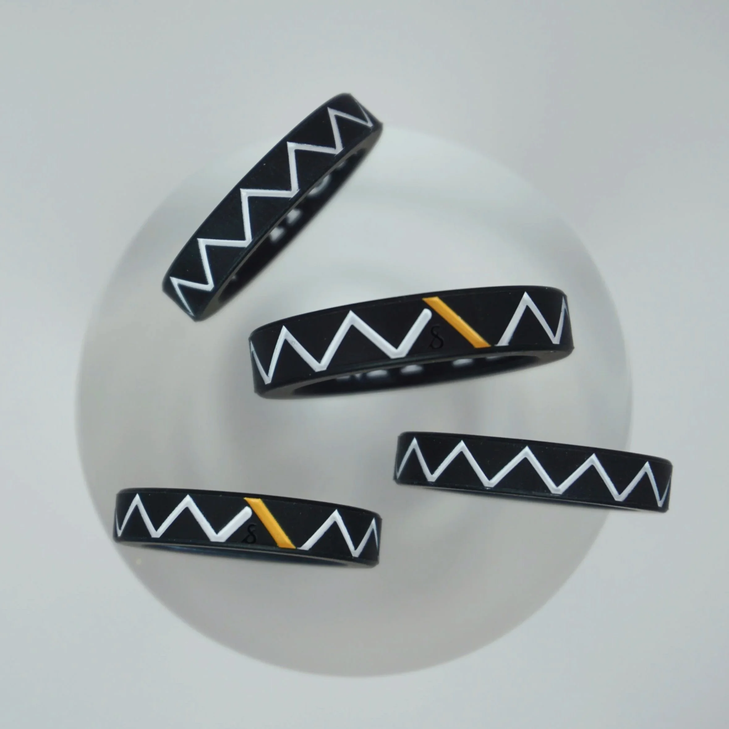 Flexible and durable black silicone ring designed to be cut when you find your person