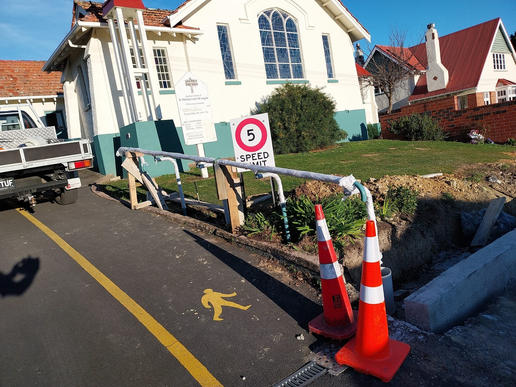 Custom hand rail being installed outside local church to improve safety and accessibility for it's church goers.