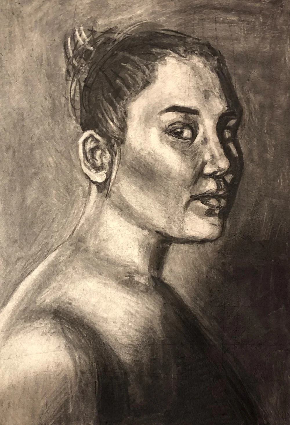 Self Portrait in Charcoal by Nicole McKinney, charcoal on drawing paper, 18 inches by 24 inches, finished in June 2019.