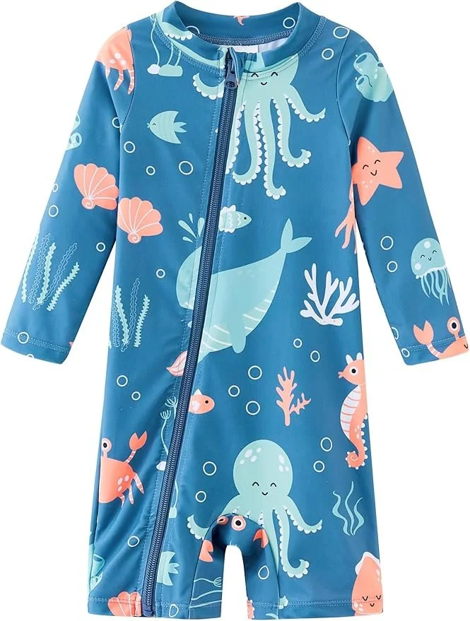 Blue children's raincoat with ocean-themed print including an octopus, whale, starfish, jellyfish, crab, seahorse, and various sea plants.