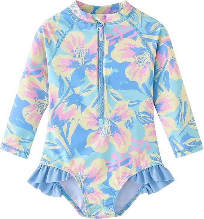 Children's long-sleeve swimsuit with a pastel floral pattern, ruffled hem, and front zipper.