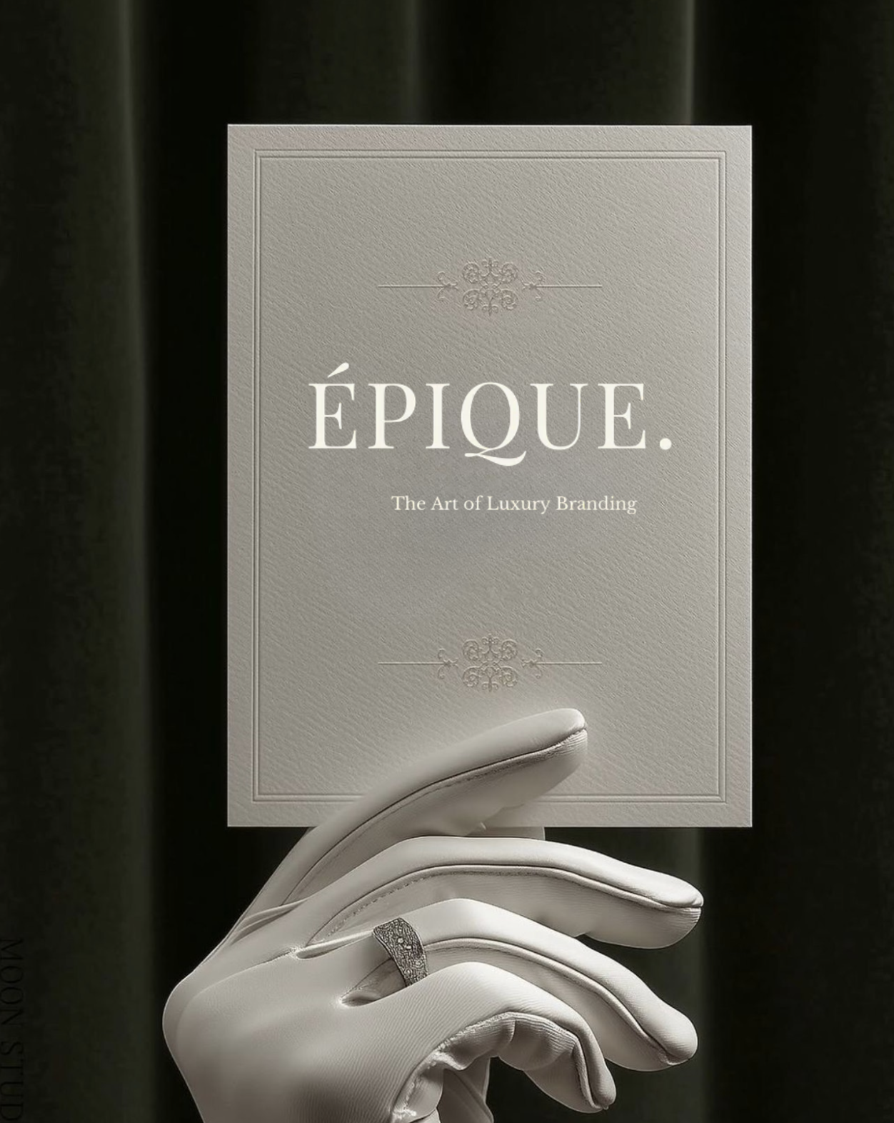 A hand in a white glove holding a luxury branding booklet titled 'ÉPIQUE. The Art of Luxury Branding' against a black background.