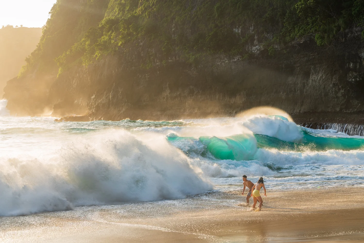 Waves breaking on a beach at sunset