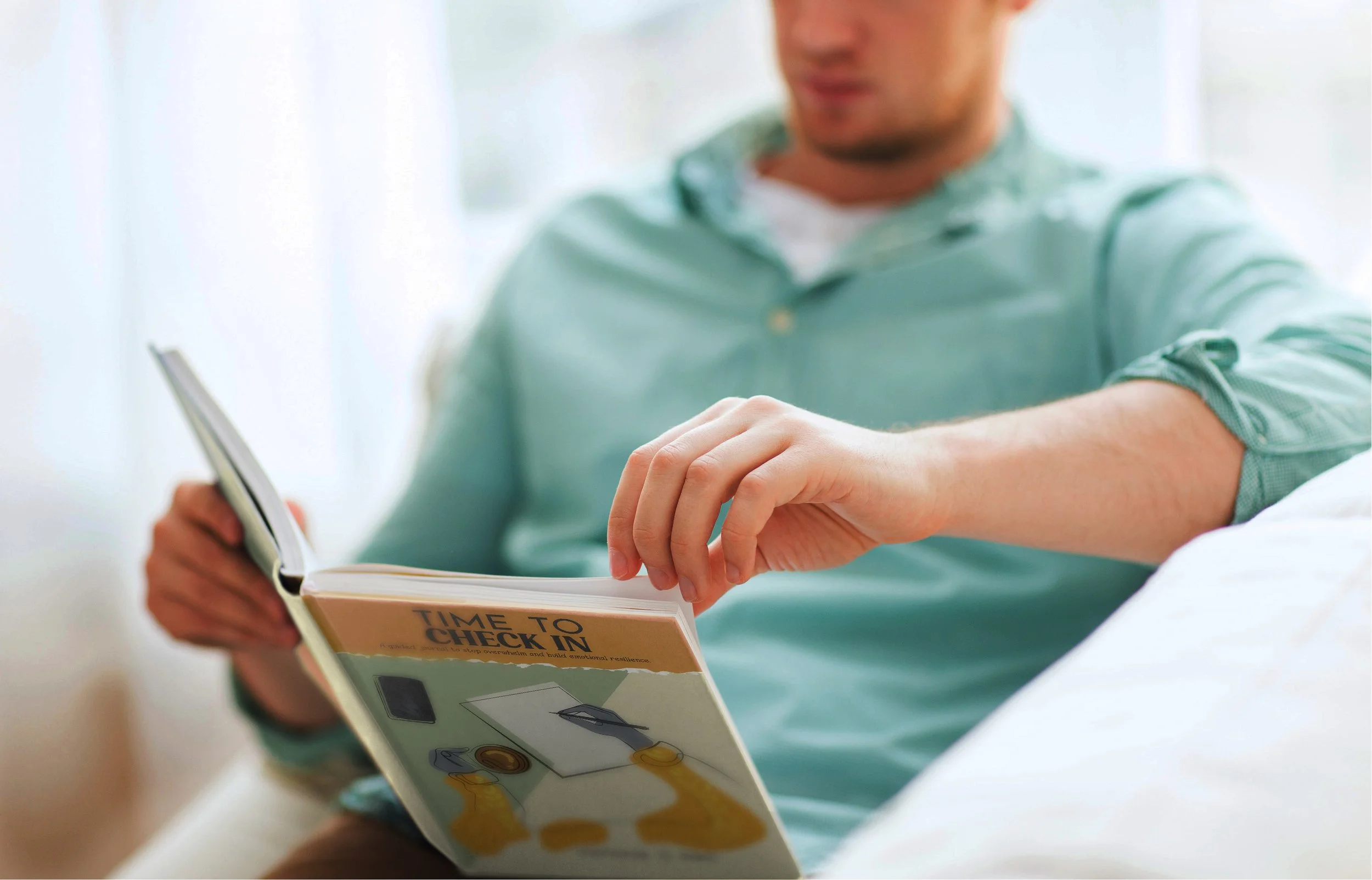 Person sitting on a bed, reading a book titled 'Time to Check In' with a cover illustration of coins and a coin slot.

"Time to Check In" by Victoria C. Neil