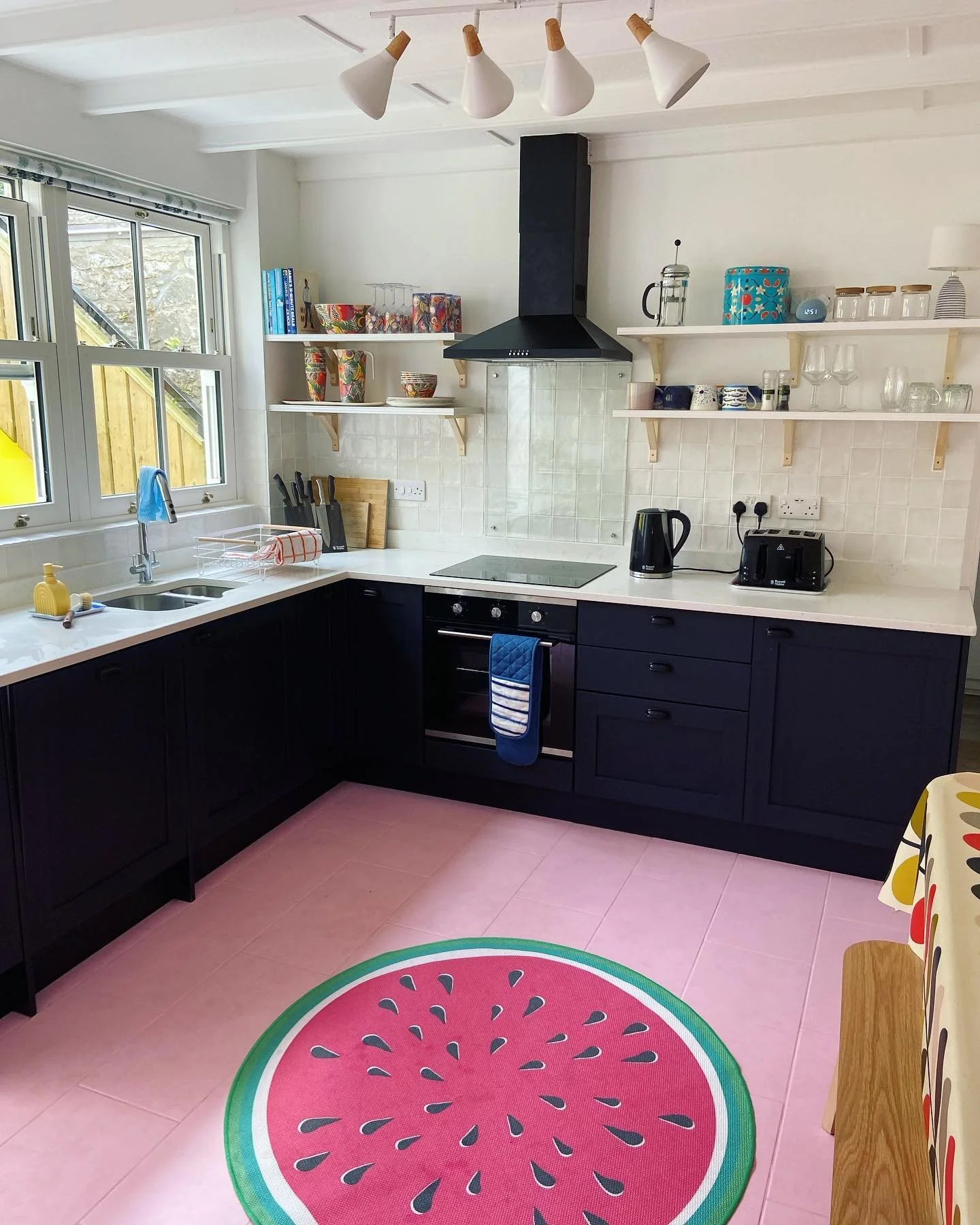 Very much enjoying this watermelon rug on the pink party floor -what more would you need for a jolly holiday cottage kitchen 💕🍉 💖 #holidaycottage #tremydon #seasideholiday #hottub #seaview #seaside #beach #dogwalks #fishnchips #cardiganbay #dolphi