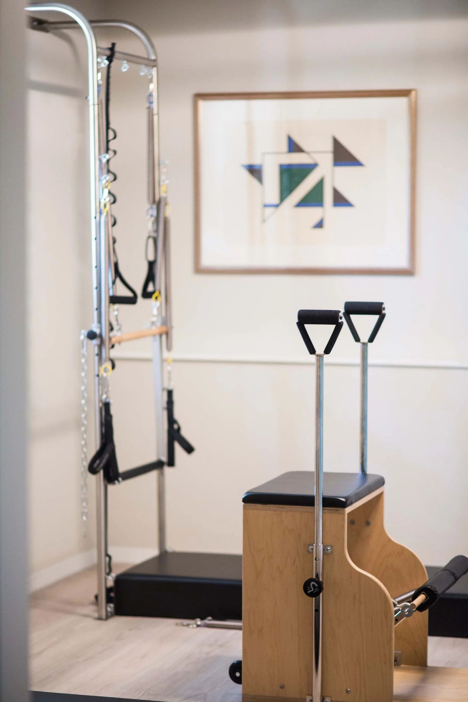 Fully equipped room, at Phaedra Pilates Studio in Lugano, with a Balanced Body Wunda Chair, Tower and other classical Pilates equipment.