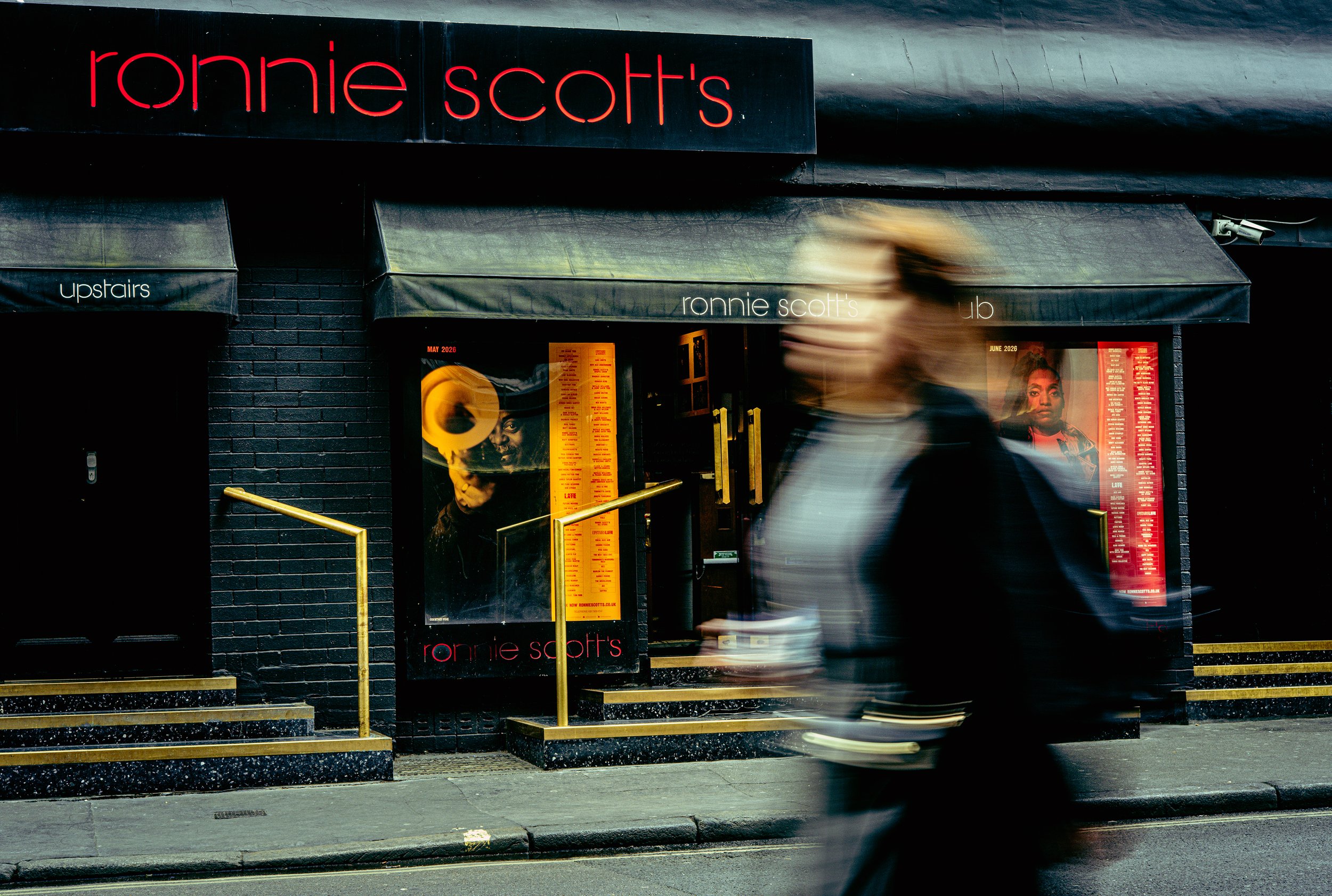 If I don't ask for their permission, I make sure people are not identifiable in my images. A shutter speed of 1/6sec gives it extra mystery. Can I see a face there?