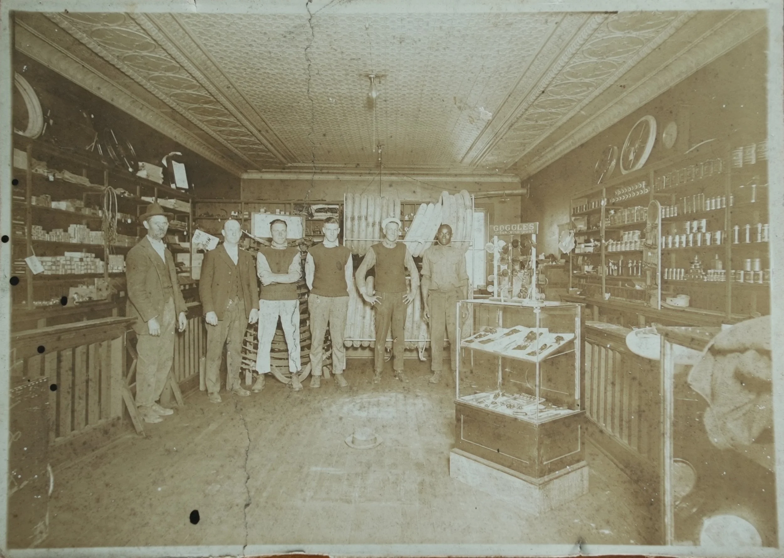 During the Depression, Proctor sells a variety of goods such as tires, appliances, bicycles, boats, freezers, lamps, and more to stay afloat