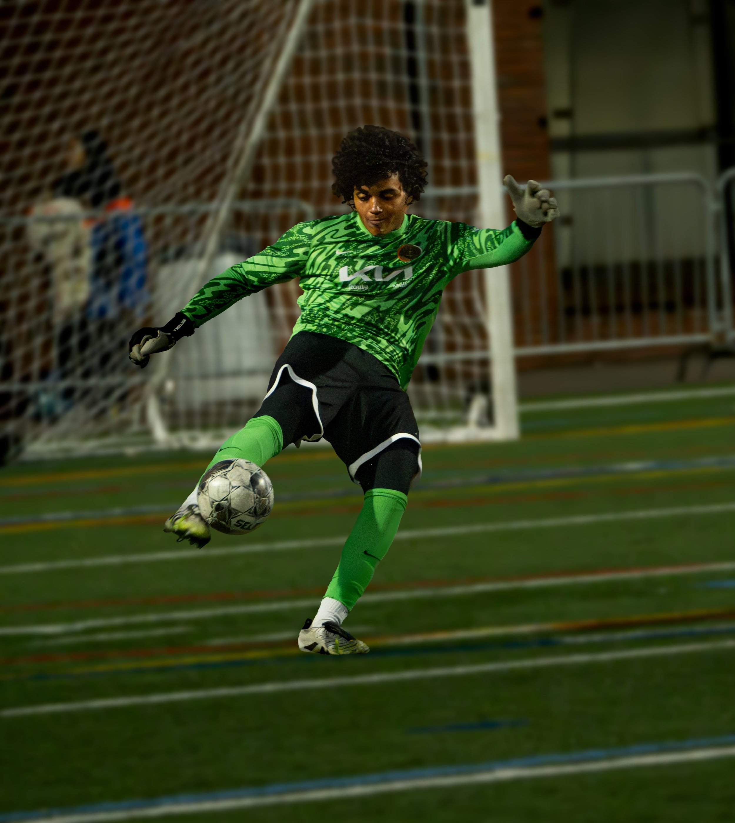 Green GOAL Keeper Kicking .jpg