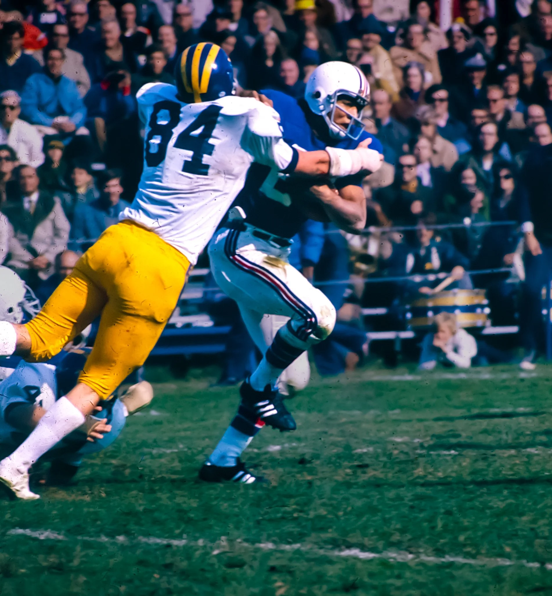 UConn Runner Being Tackled.jpg