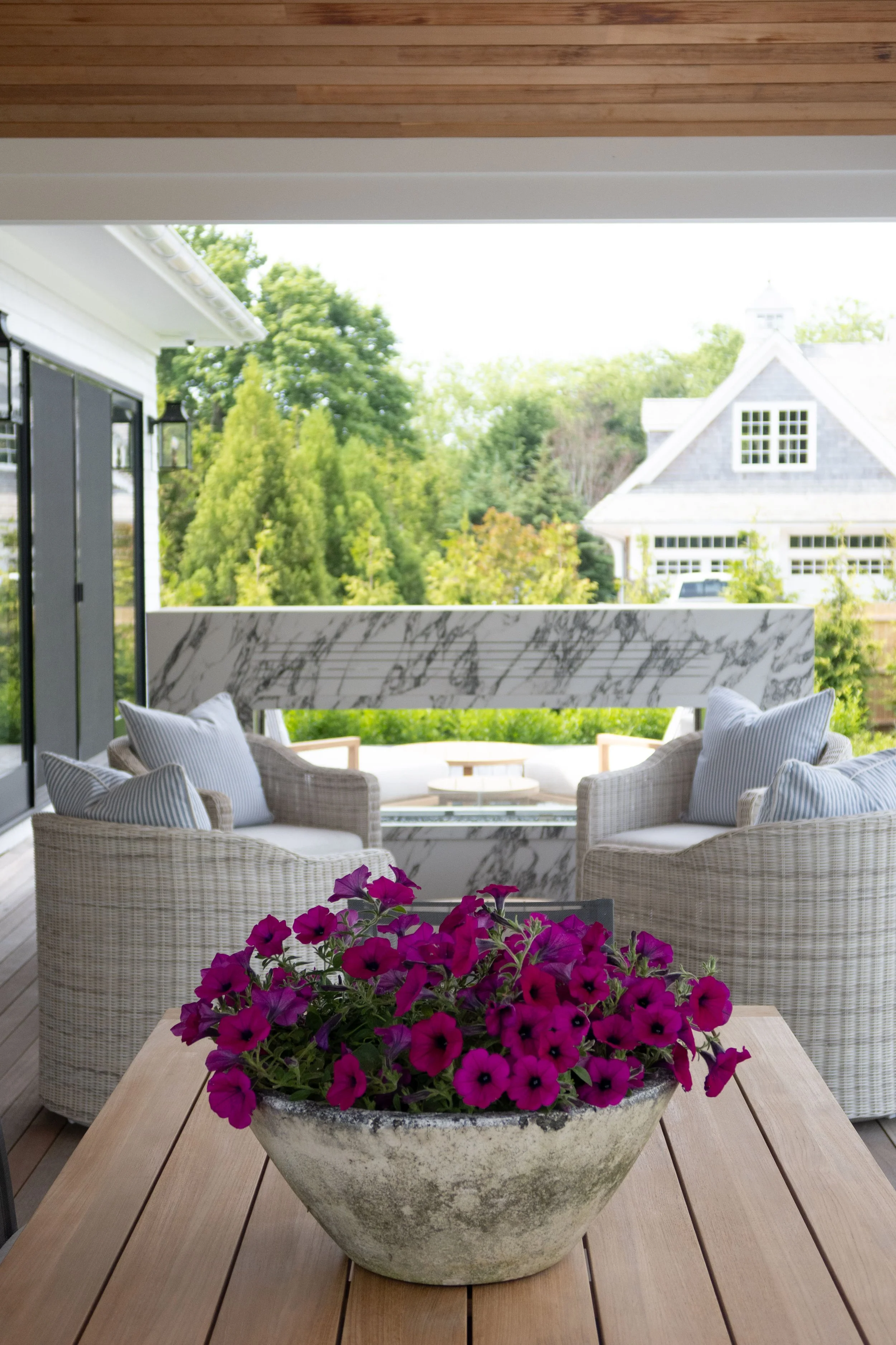 Hamptons coastal home designed by Spinazzola Interiors featuring reclaimed wood beams, handcrafted finishes and timeless luxury interiors.