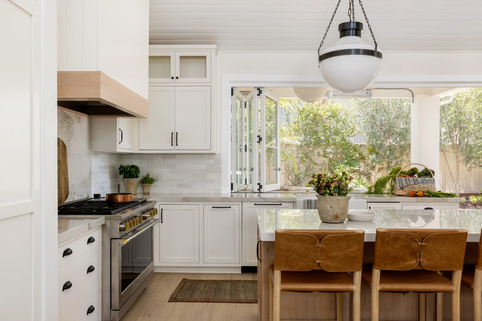 California coastal remodel by Spinazzola Interiors featuring indoor-outdoor living, natural materials and bespoke residential interior design.